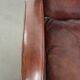 Dark cognac-coloured set of 2 sheepskin armchairs with a sleek design