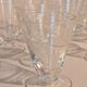Set of 13 engraved glasses decorated with reeds and flowers, 1960.