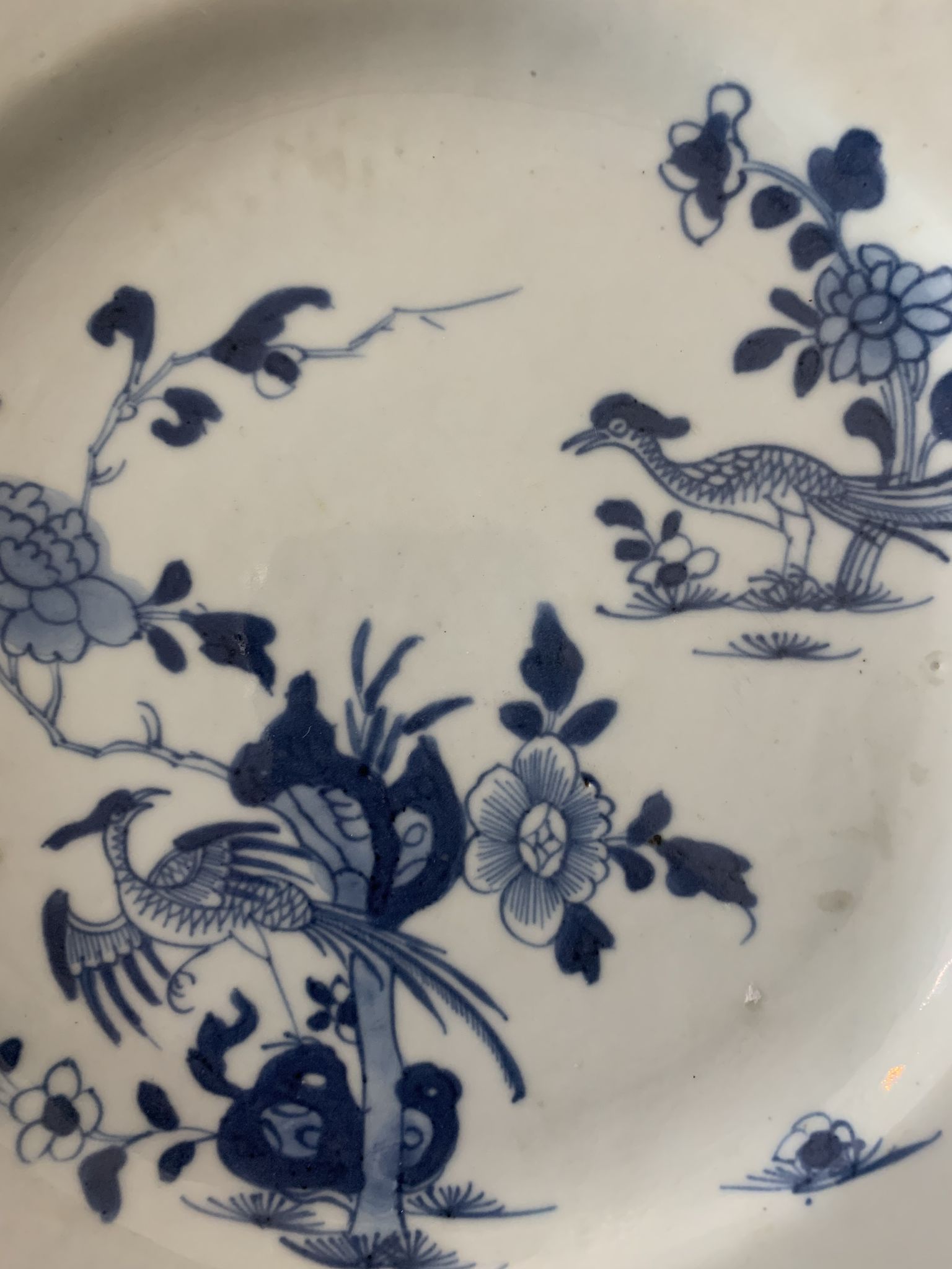 Blue and white porcelain plate of the blue family, 19th century
