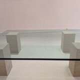 Table en verre et pieds en travertin