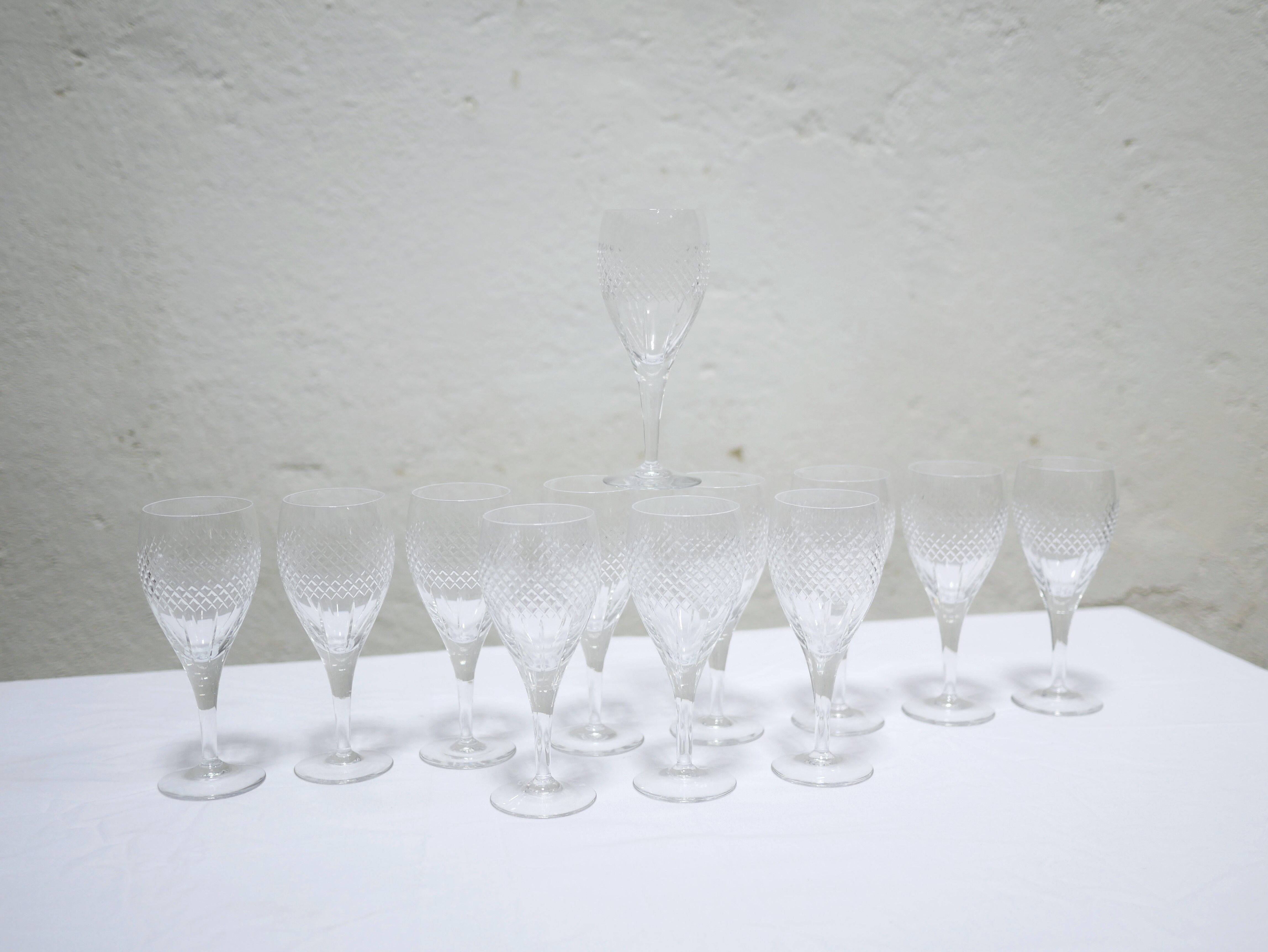 Series of 12 vintage red crystal wine glasses
