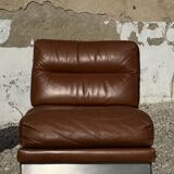 2 armchairs and 1 ottoman in brushed aluminium and brown leather, France, 1970.