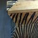 Tabouret coffre en teck naturel brun et noir.