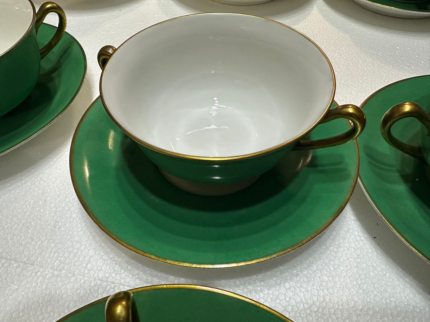 Service 14 cup and saucer in Art Deco Emerald Green and Gold.