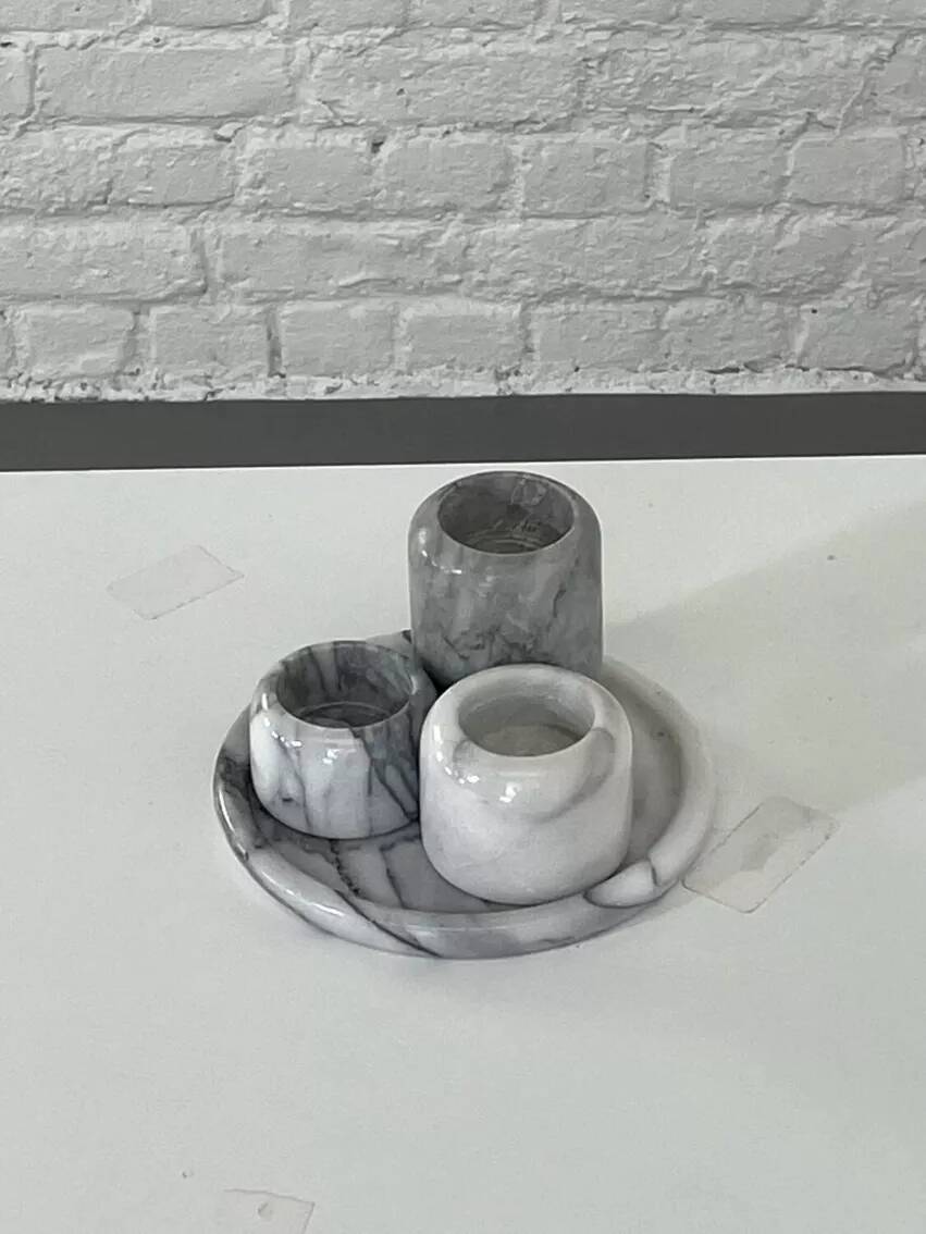 Set of marble candle holders with base