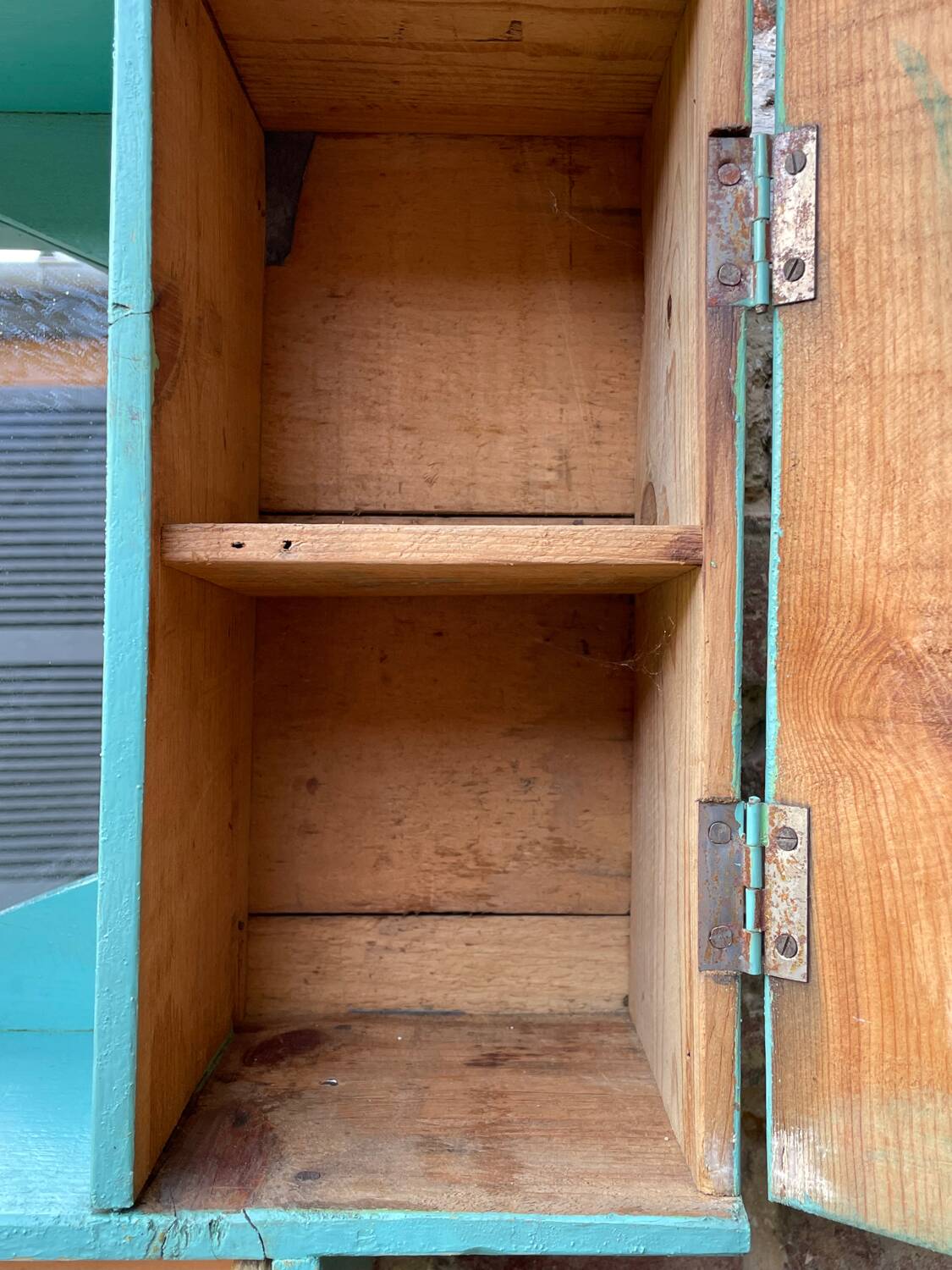 Old wall-mounted bathroom cabinet