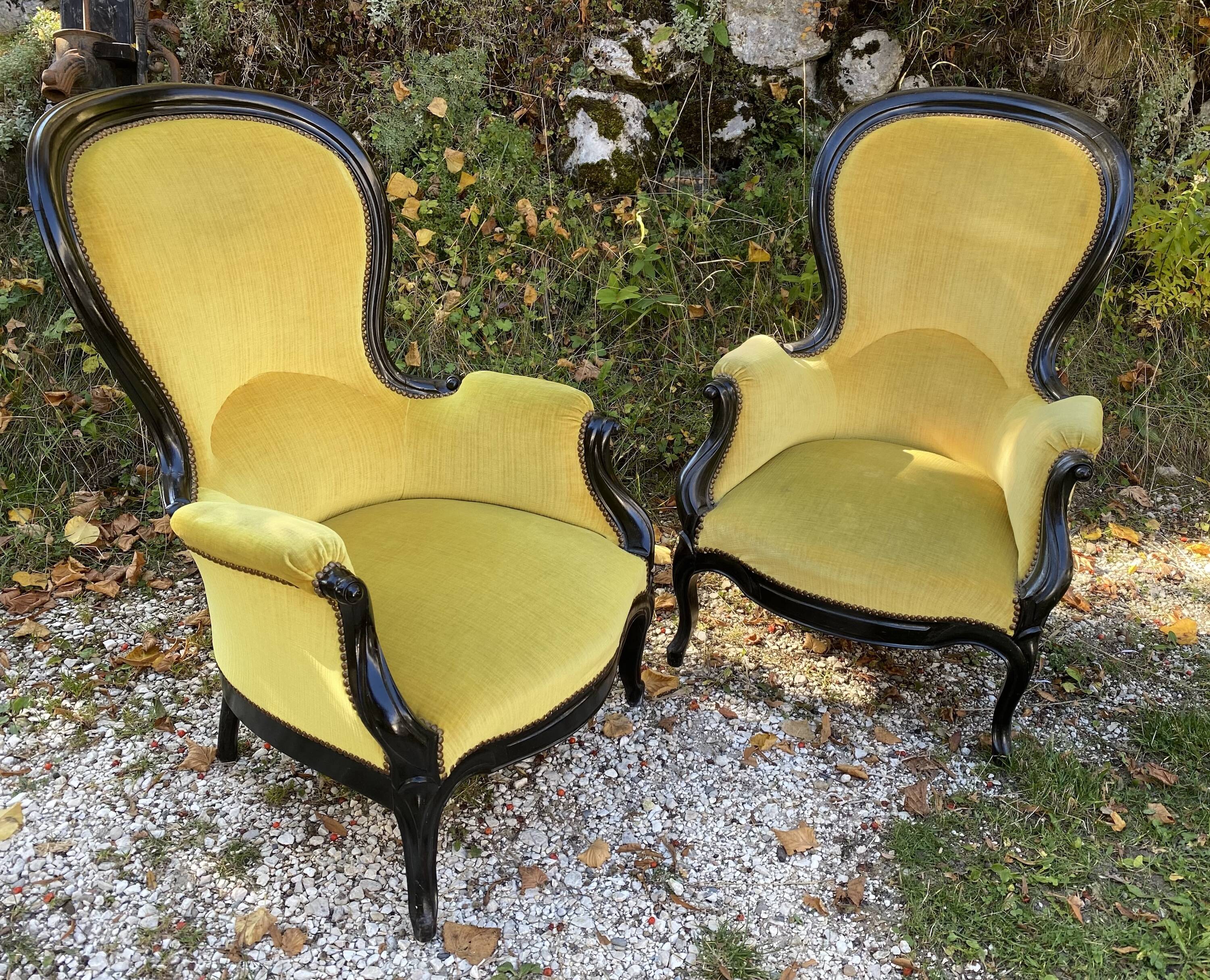 Pair of 19th century armchairs in black lacquered wood