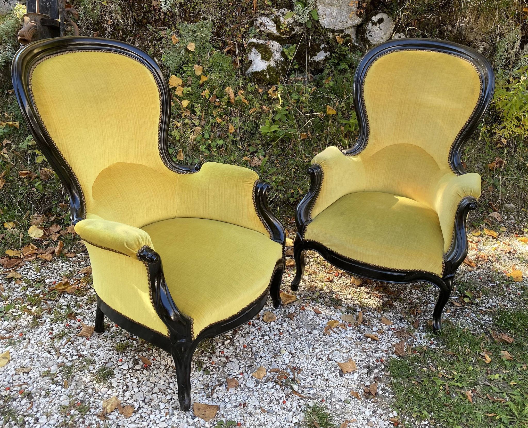 Pair of 19th century armchairs in black lacquered wood