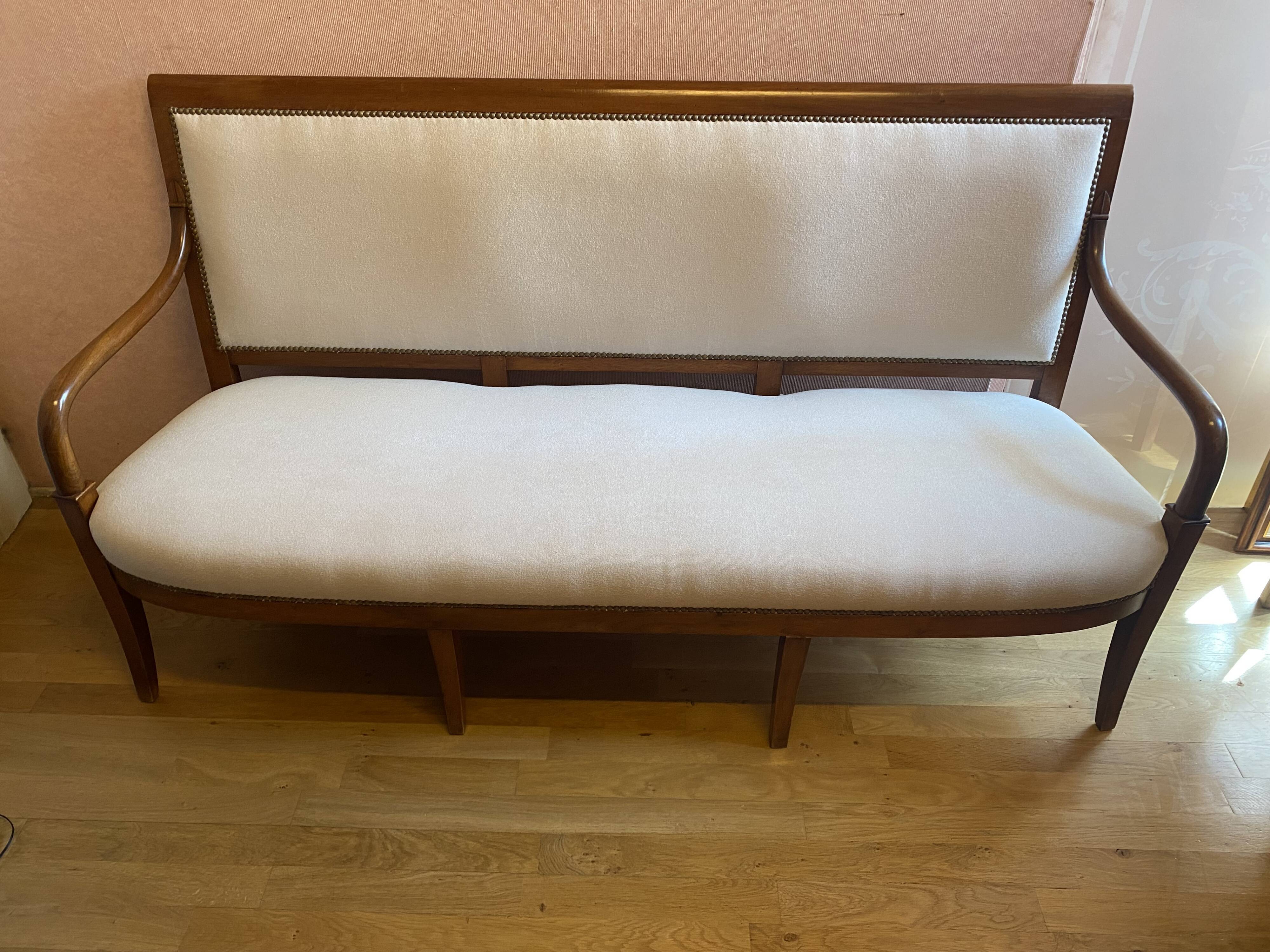 Walnut bench, from the restoration period, covered in white.