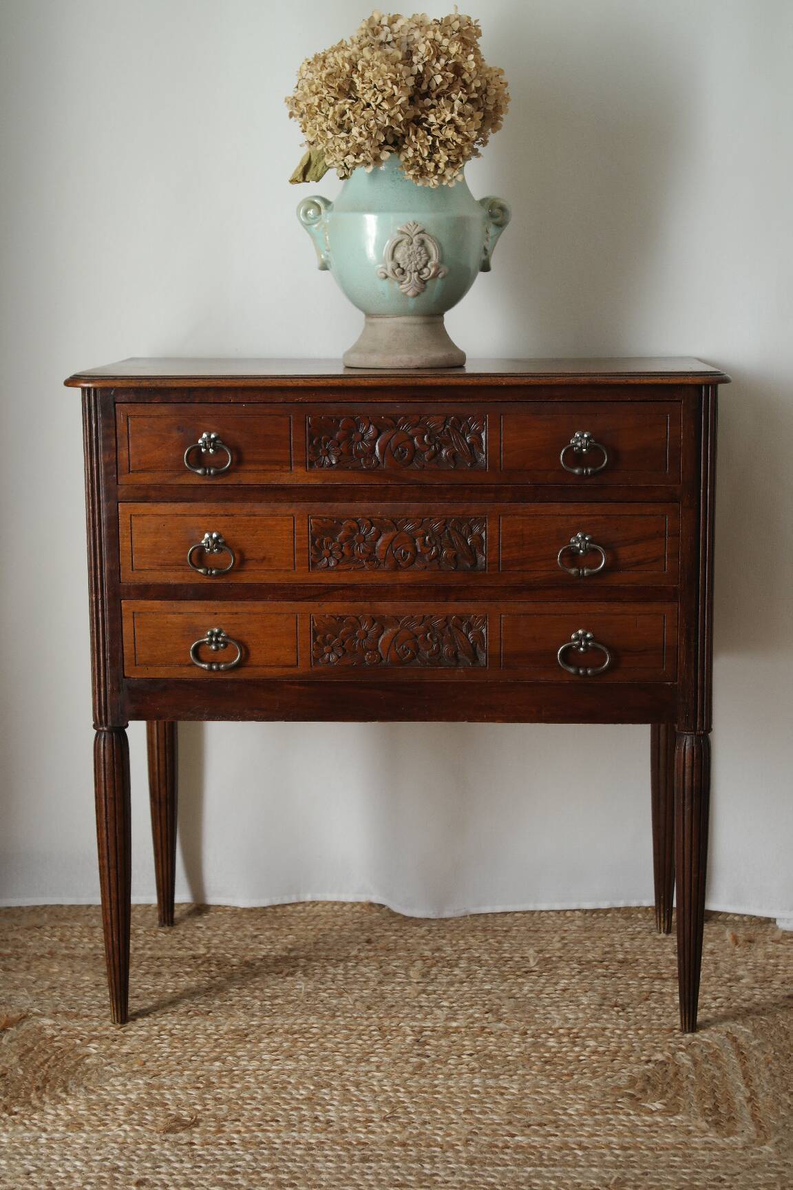 Solid walnut chest of drawers from the early 20th century.