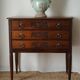 Solid walnut chest of drawers from the early 20th century.
