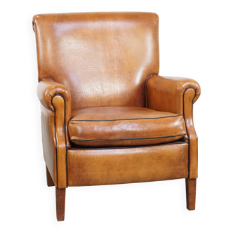 Fauteuil en cuir de mouton marron