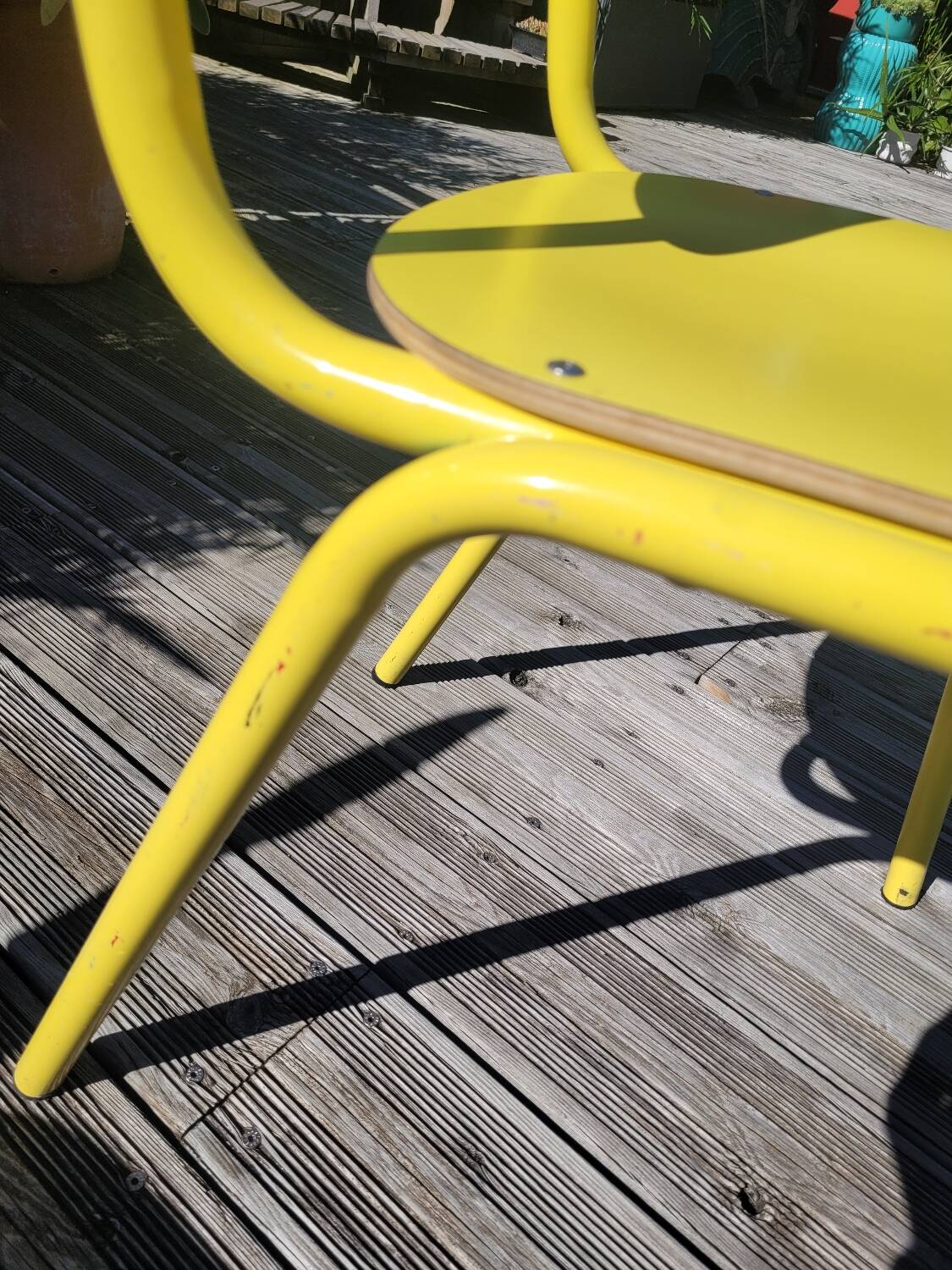 Pair of yellow plywood chairs
