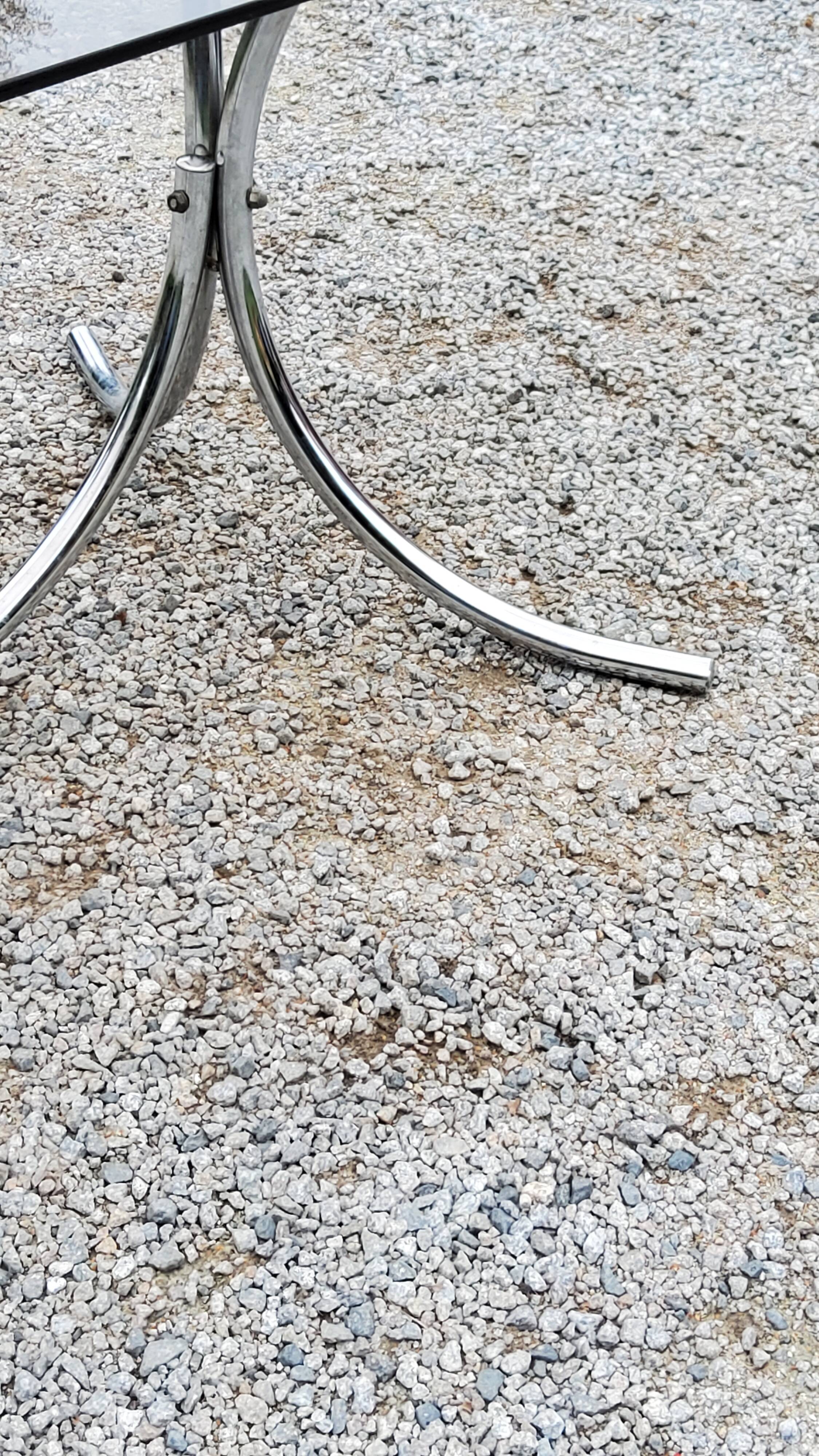 Dining table from the 70s top smoked glass base chrome