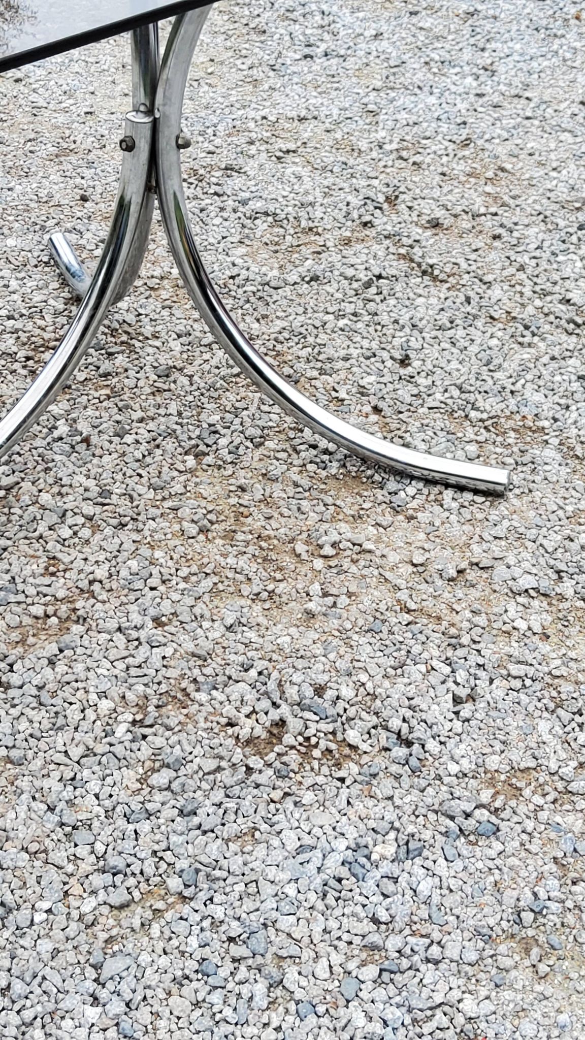 Dining table from the 70s top smoked glass base chrome