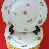 Suite of eighteen plates (18) of flat table in Limoges porcelain with floral decoration
