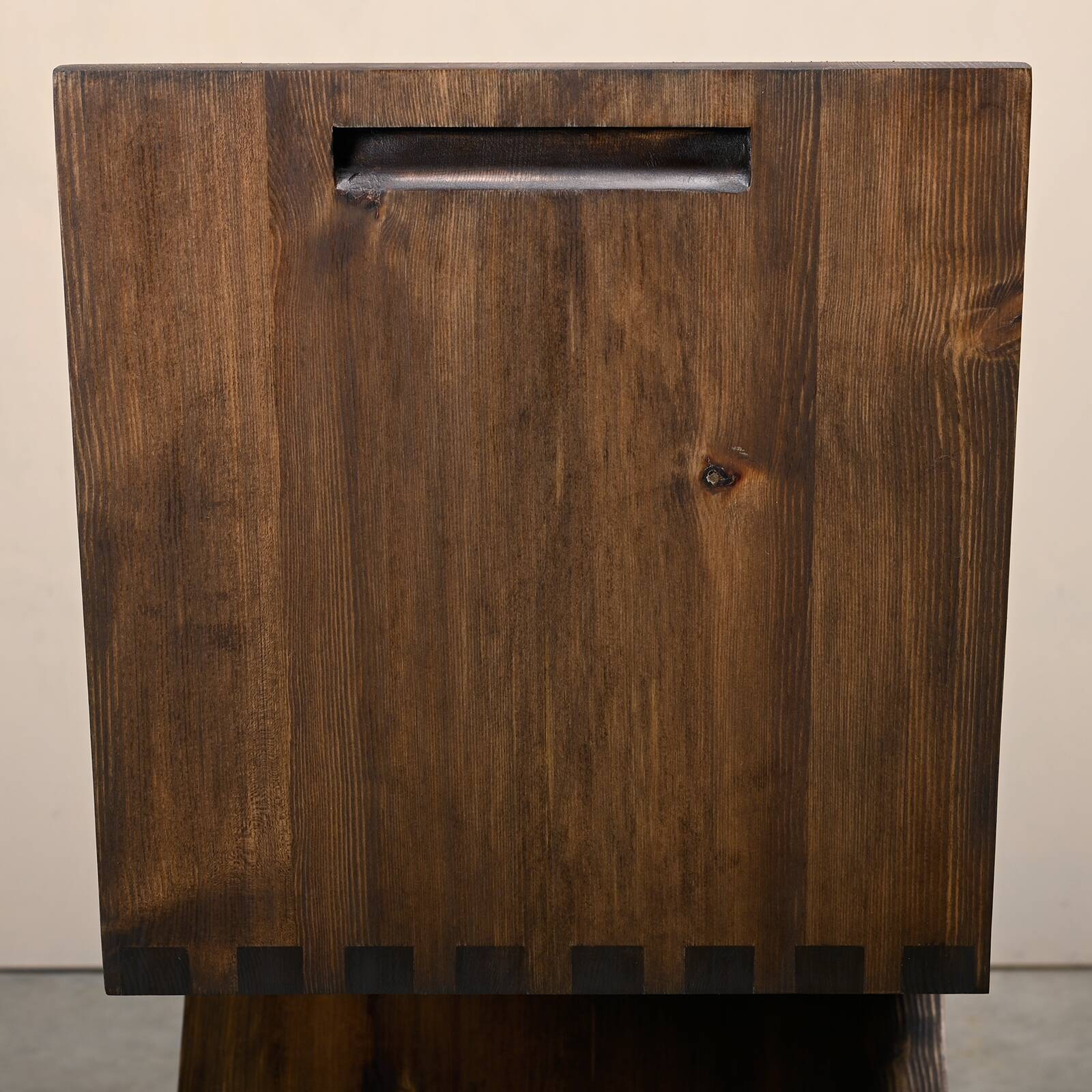 Gerrit Rietveld Zig Zag Chair is dark brown stained wood