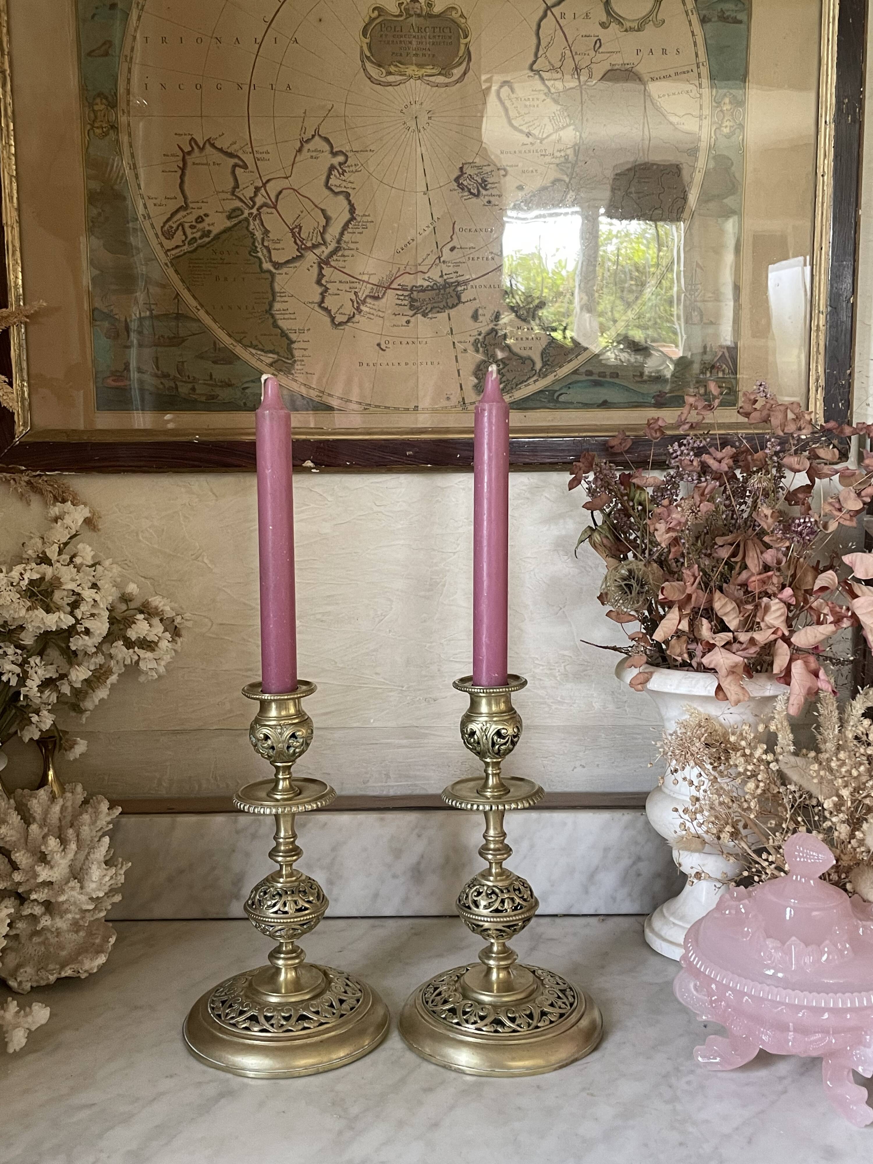 pair of openwork gilded brass candlesticks from the 19th century