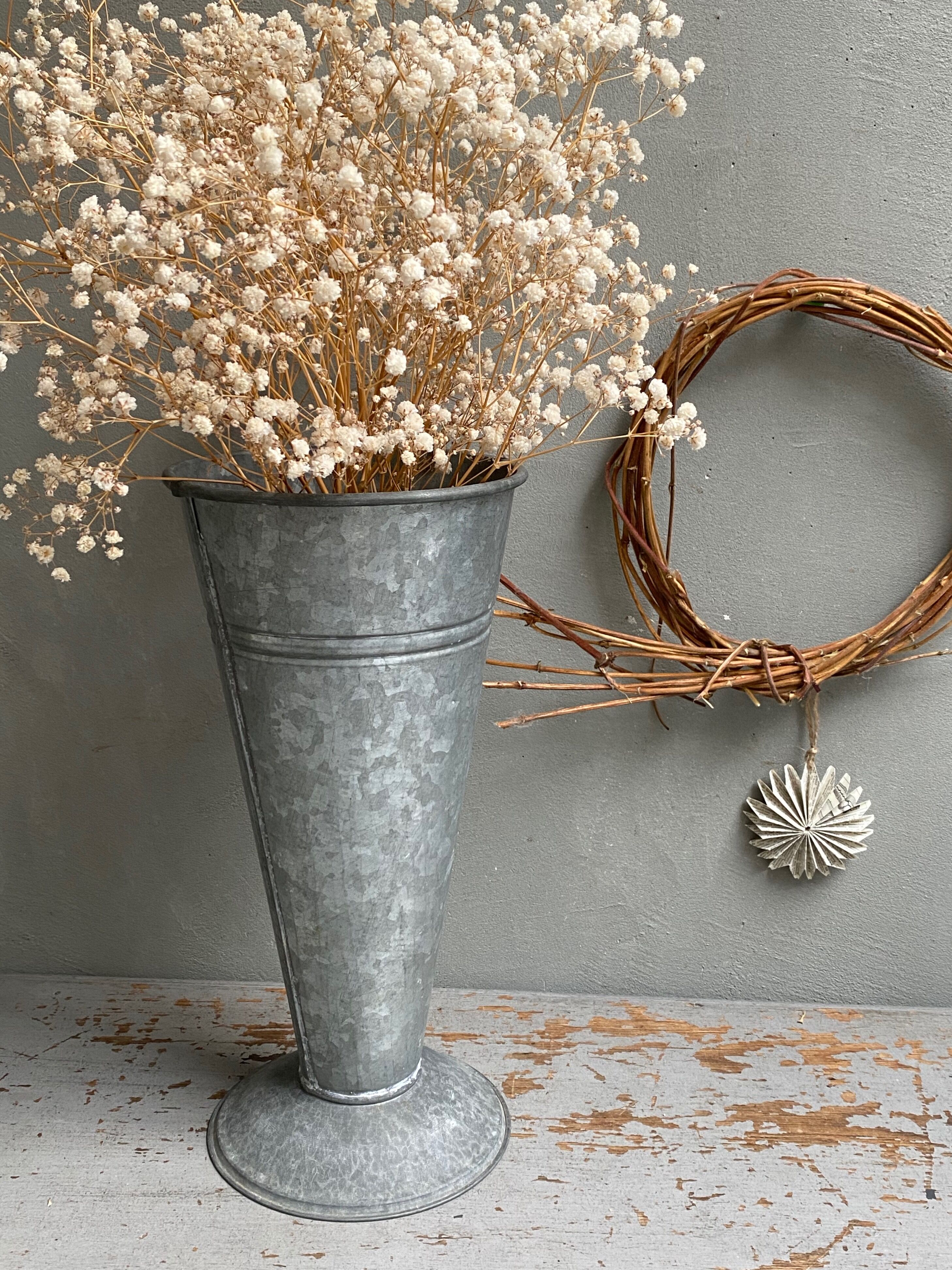 Old zinc florist's vase