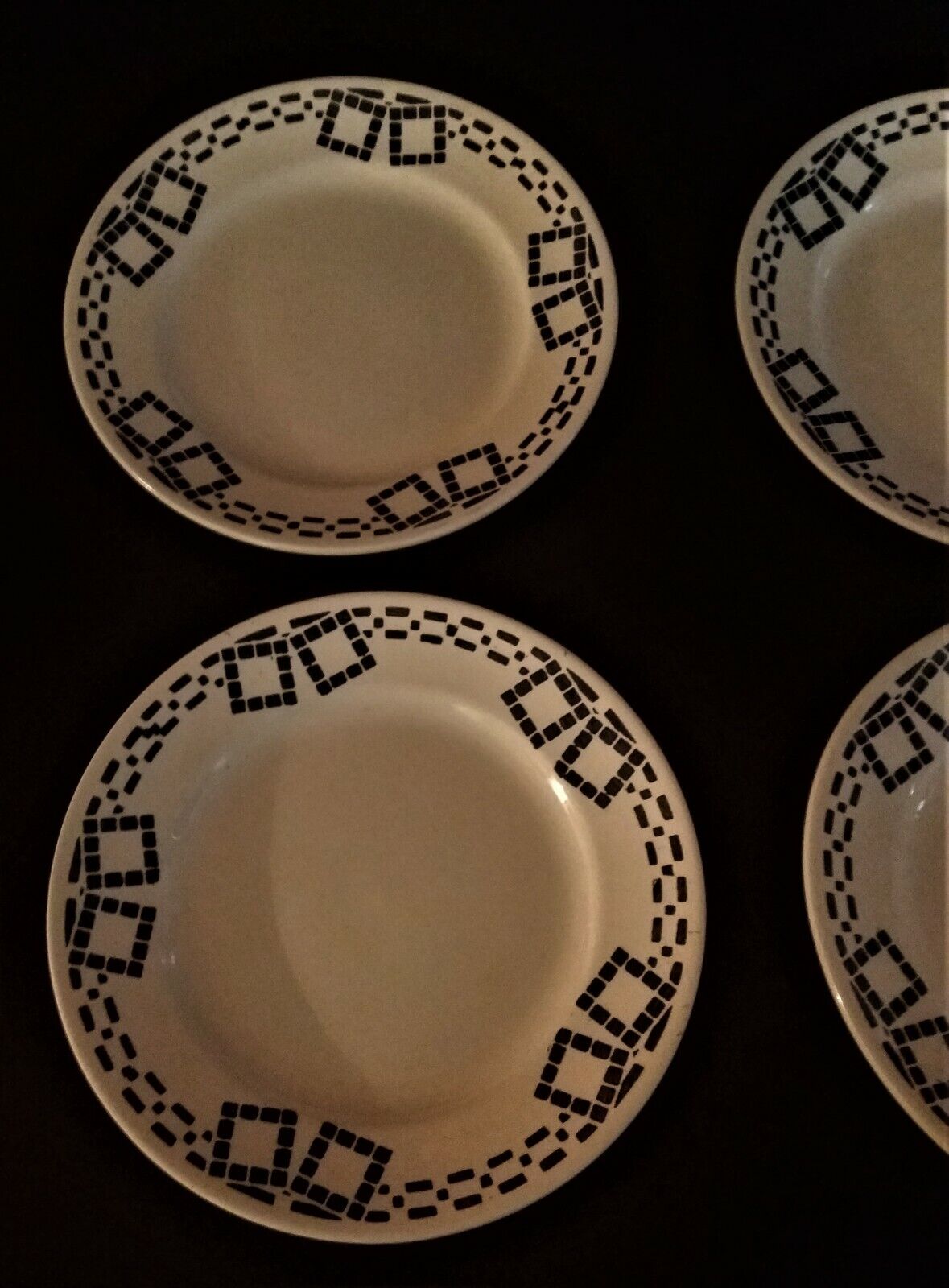 Series of four flat earthenware plates P.B. Rochechouart Limoges model Anna