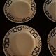 Series of four flat earthenware plates P.B. Rochechouart Limoges model Anna