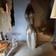 Abstract sculpture "naked woman" in stone (black marble), signed work, 20th century