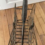 Butterfly magazine rack in patinated metal