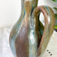 Art Nouveau style carafe in flamed stoneware with blue and brown drips