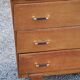 Vintage chest of drawers in golden oak from the 50s with 3 drawers and spindle-legged shelf