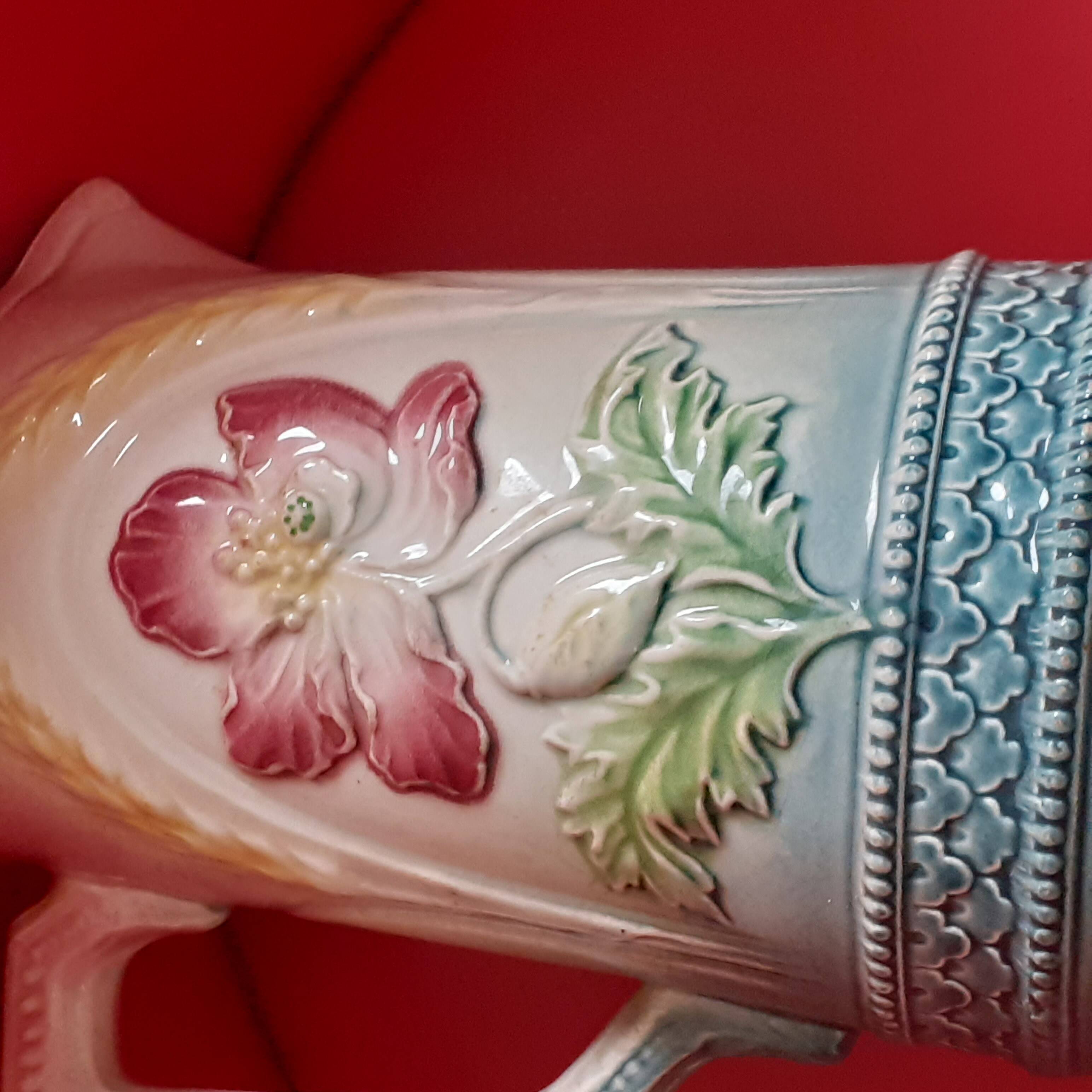 Antique Liongchamp slip pitcher. Flowers.