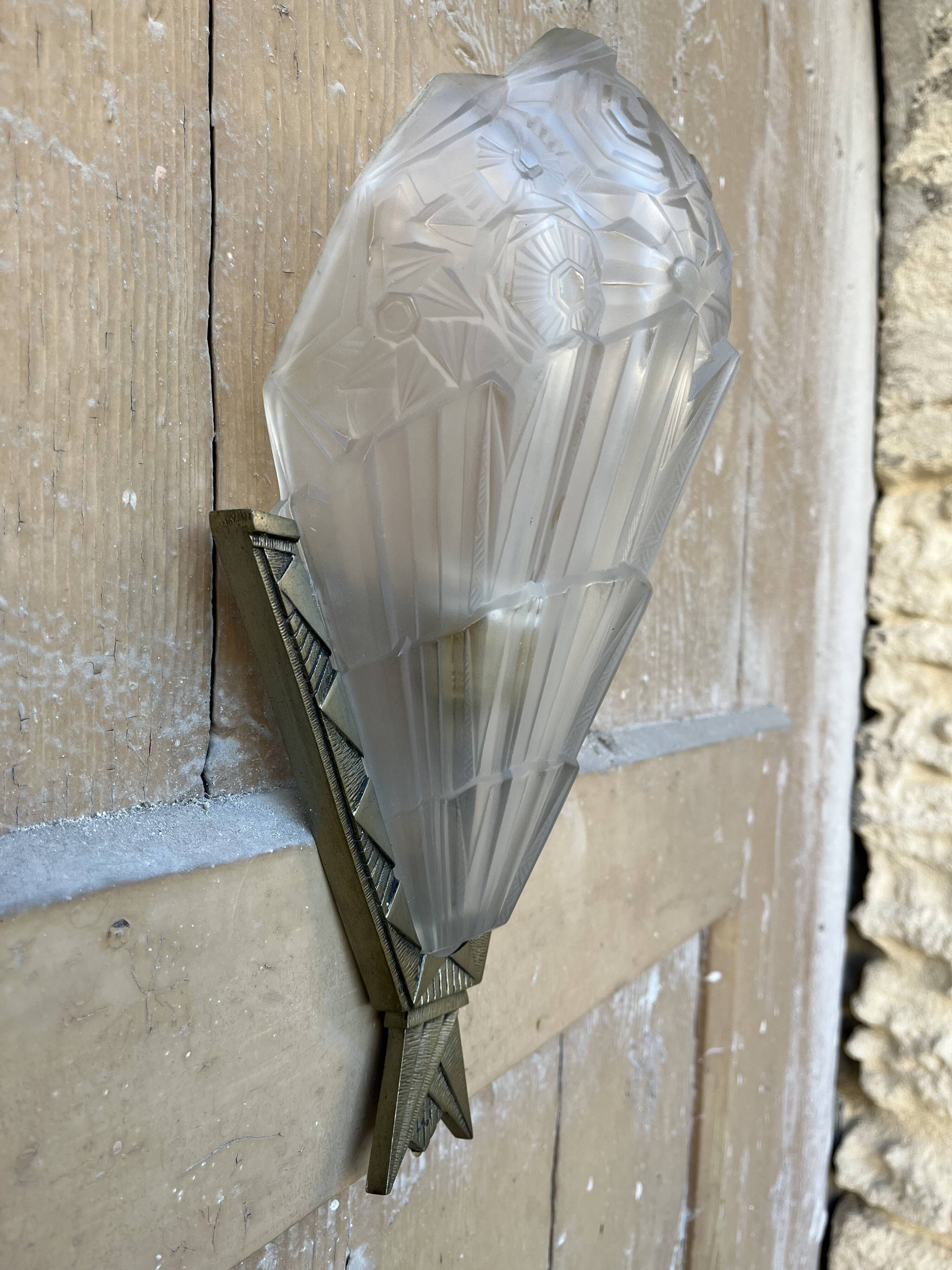 Signed art deco wall light