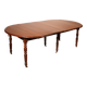 Extensible dining table from the early 19th century in walnut.