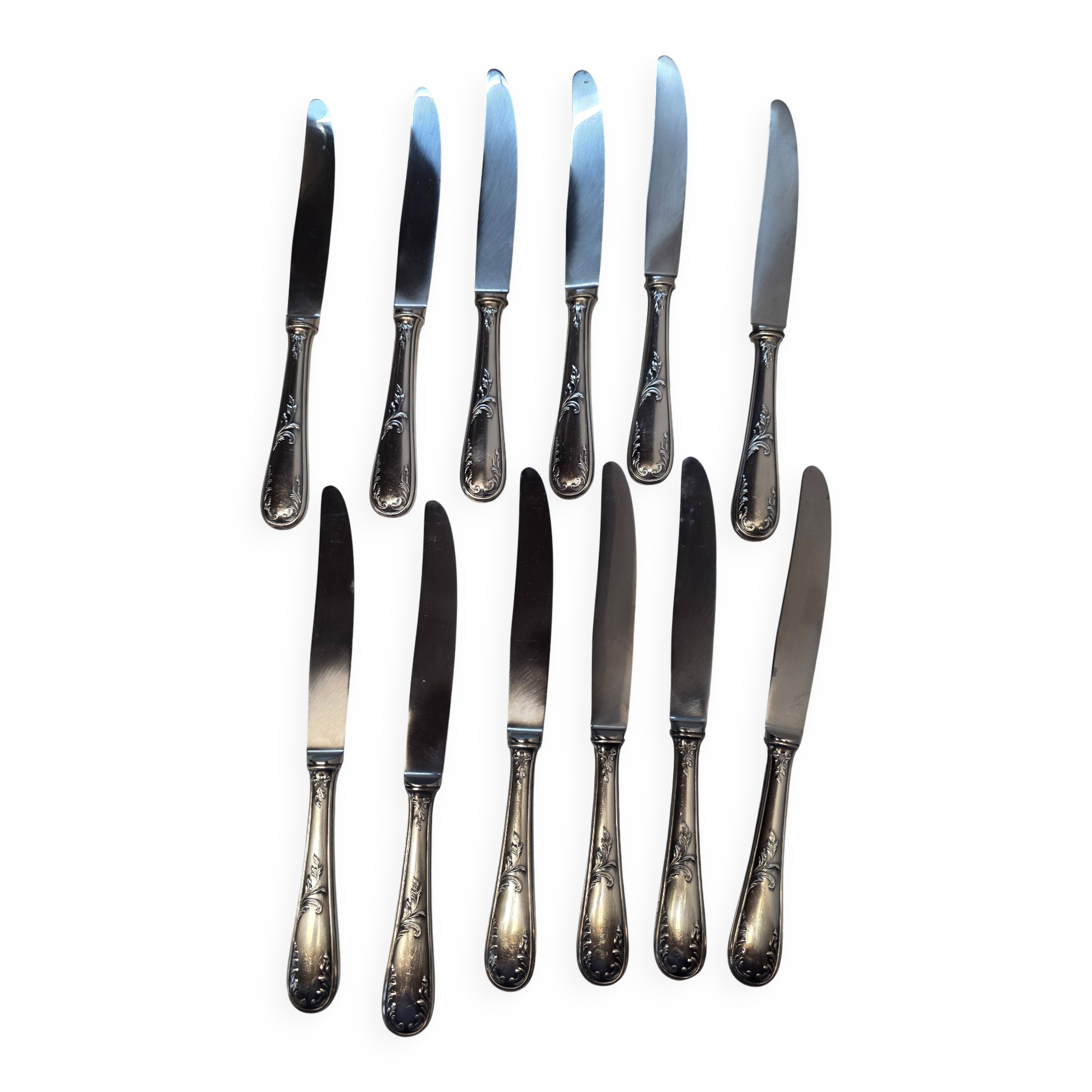 12 silver-plated knives
