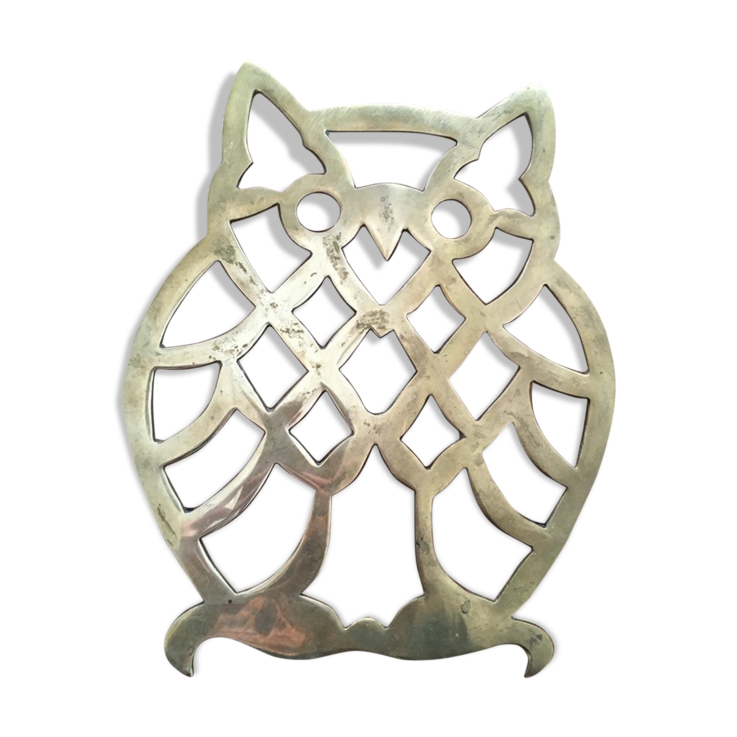 Under the nice brass dish.