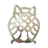 Under the nice brass dish.