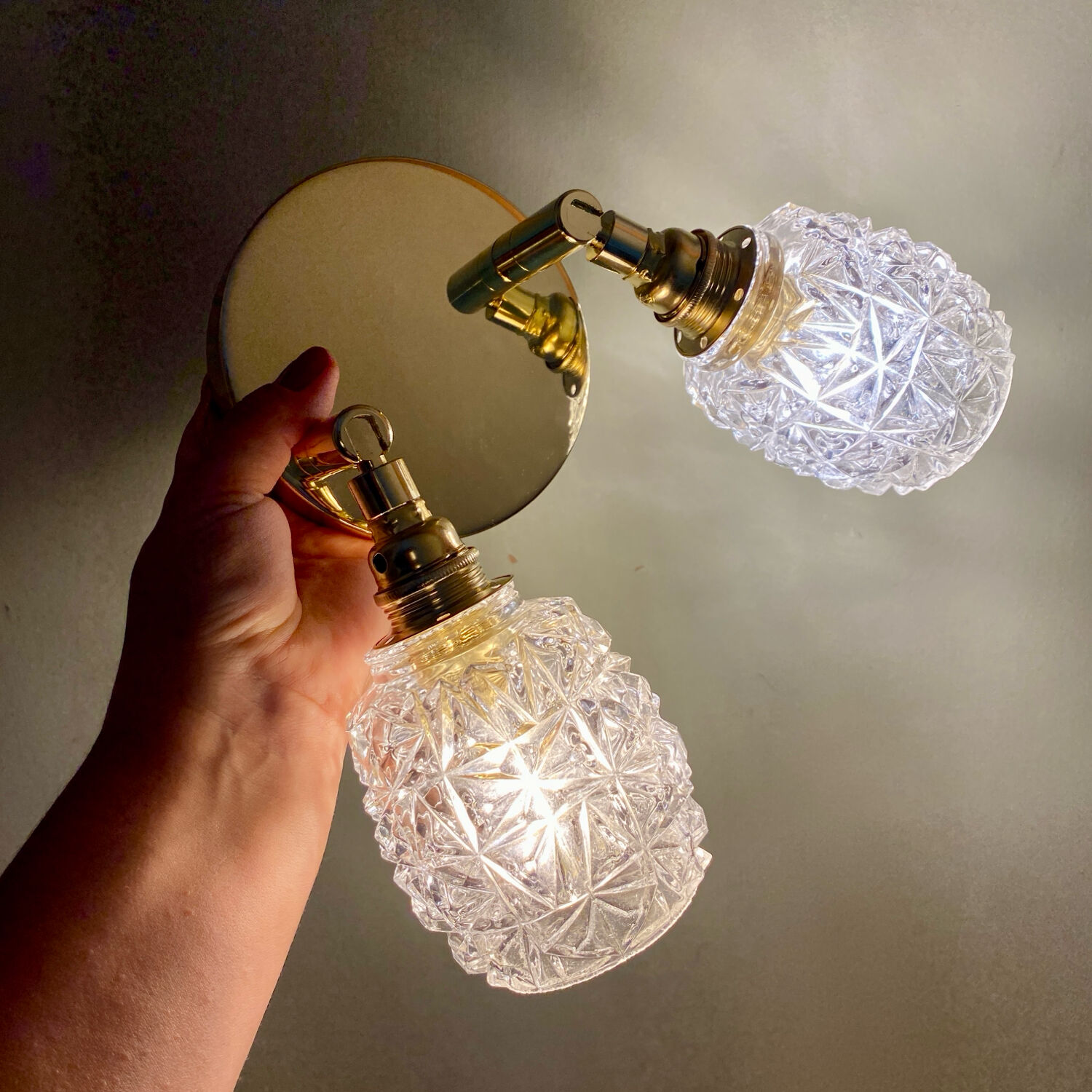 Double vintage tulip wall light in moulded glass.