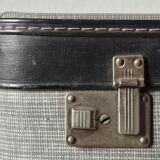 Old cardboard suitcase with its two keys