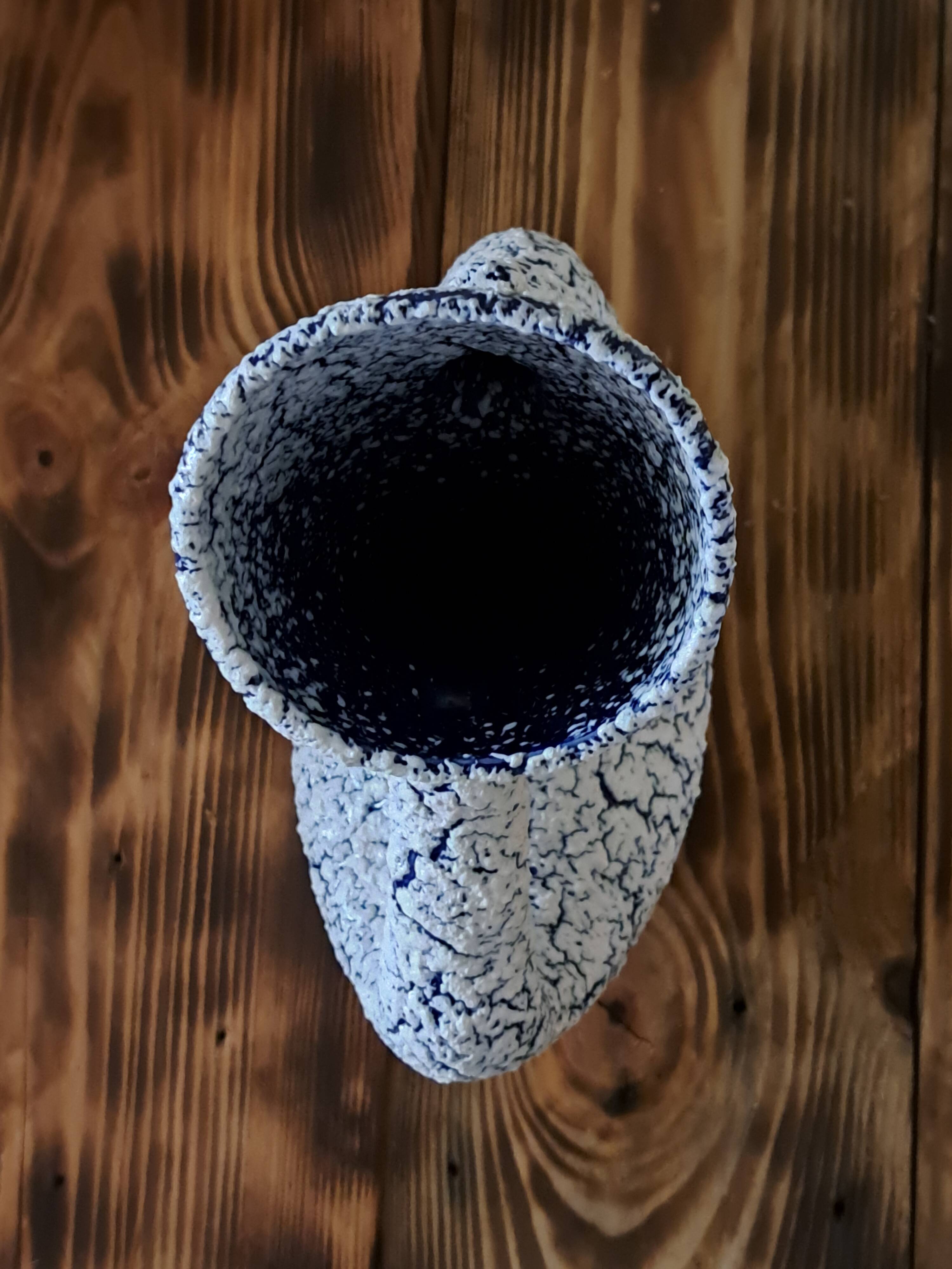 Vintage vase with double handles in blue ceramic and white crisp enamel