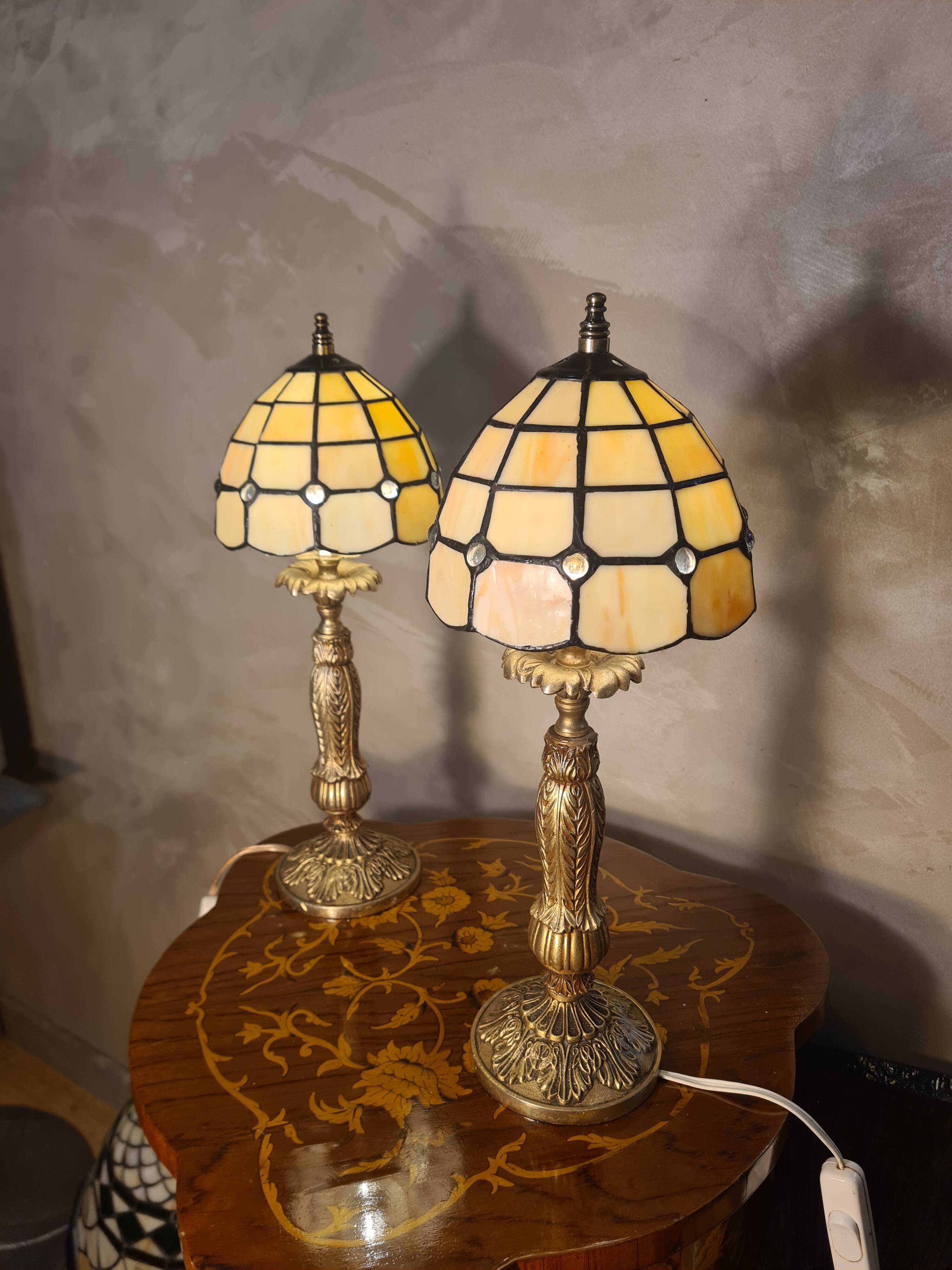 pair of bedside lamps in gilded bronze with glass shade