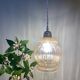 Vintage globe pendant light in bubbled amber glass