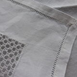18 antique napkins in white linen with an embroidered geometric decoration