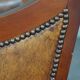 Armchair in sheepskin with wood