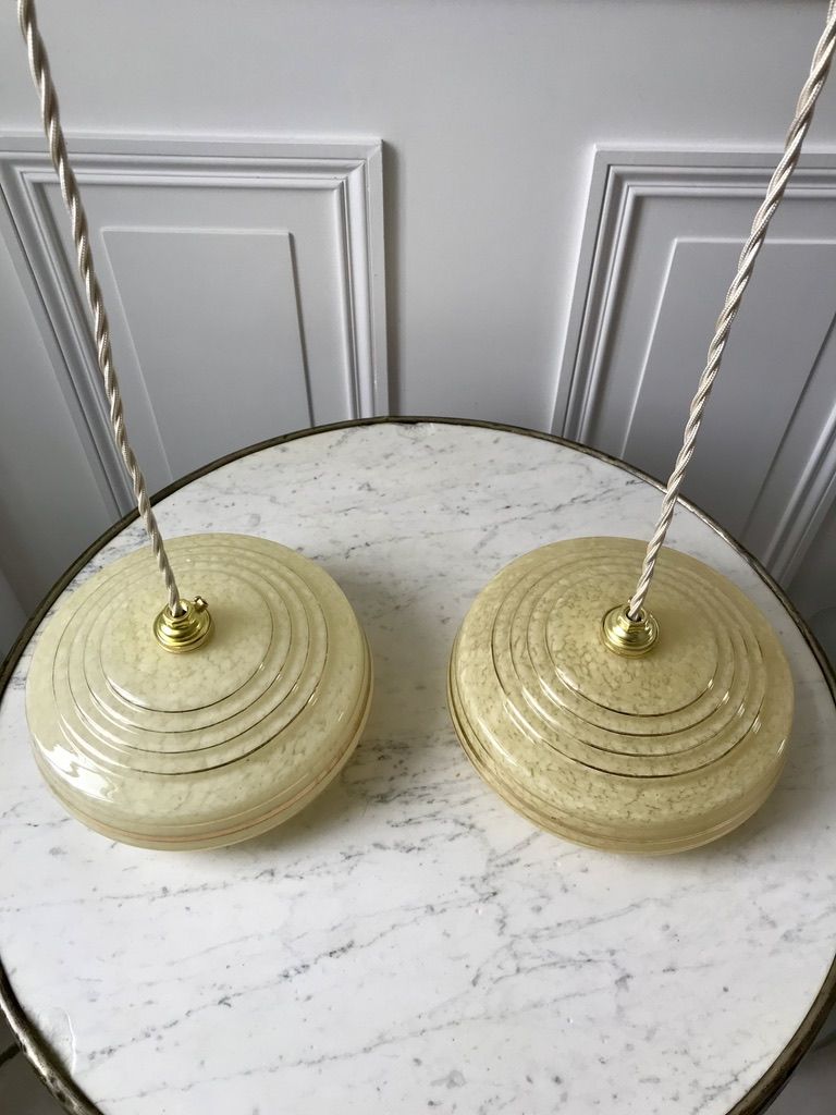 Pair of suspensions in yellow Clichy glass and golden border 40s-50s