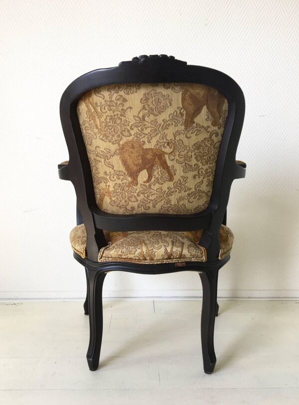 Black baroque armchair with fabric designed by wildlife by Ascension Latorre, Spain