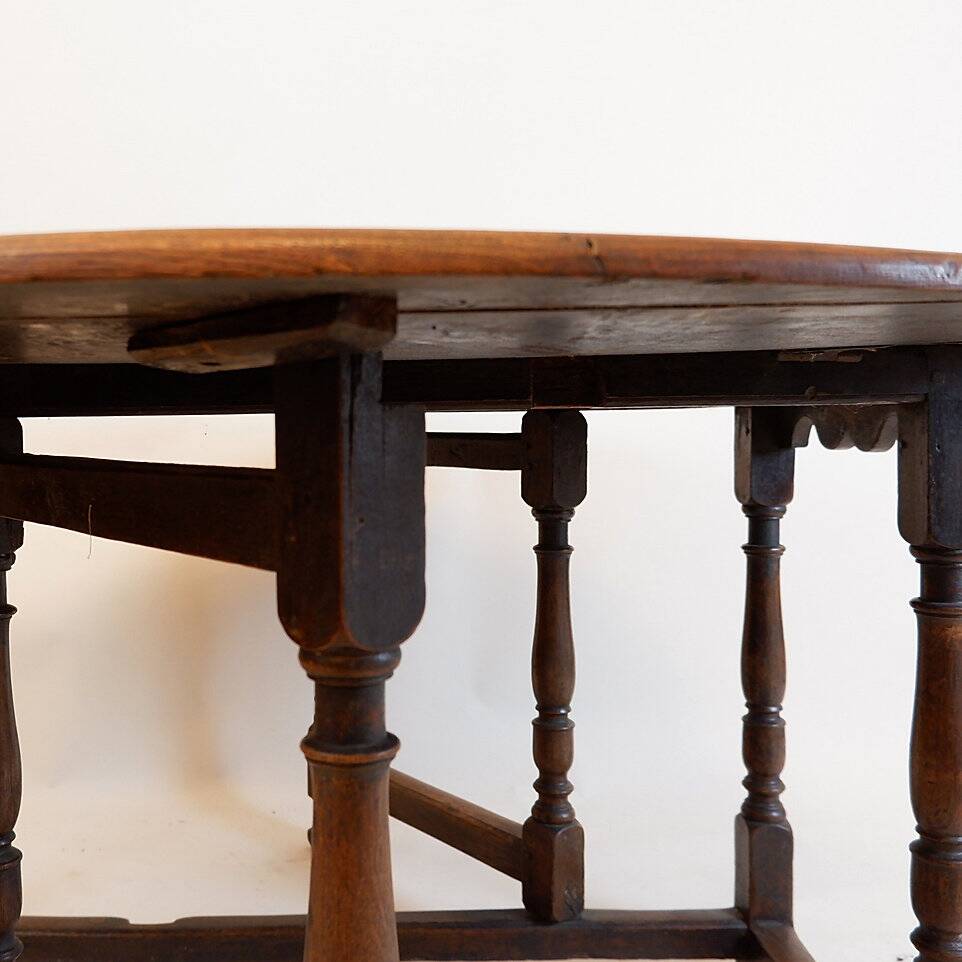 19th century English drop-leaf table with turned legs