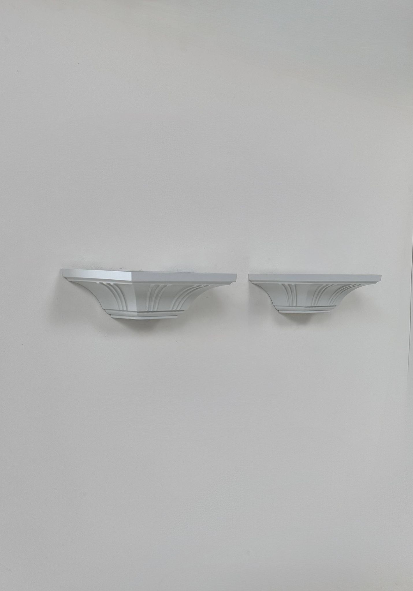 Pair of vintage wall lights, moulded pressed white matte ABS, France, 1980.