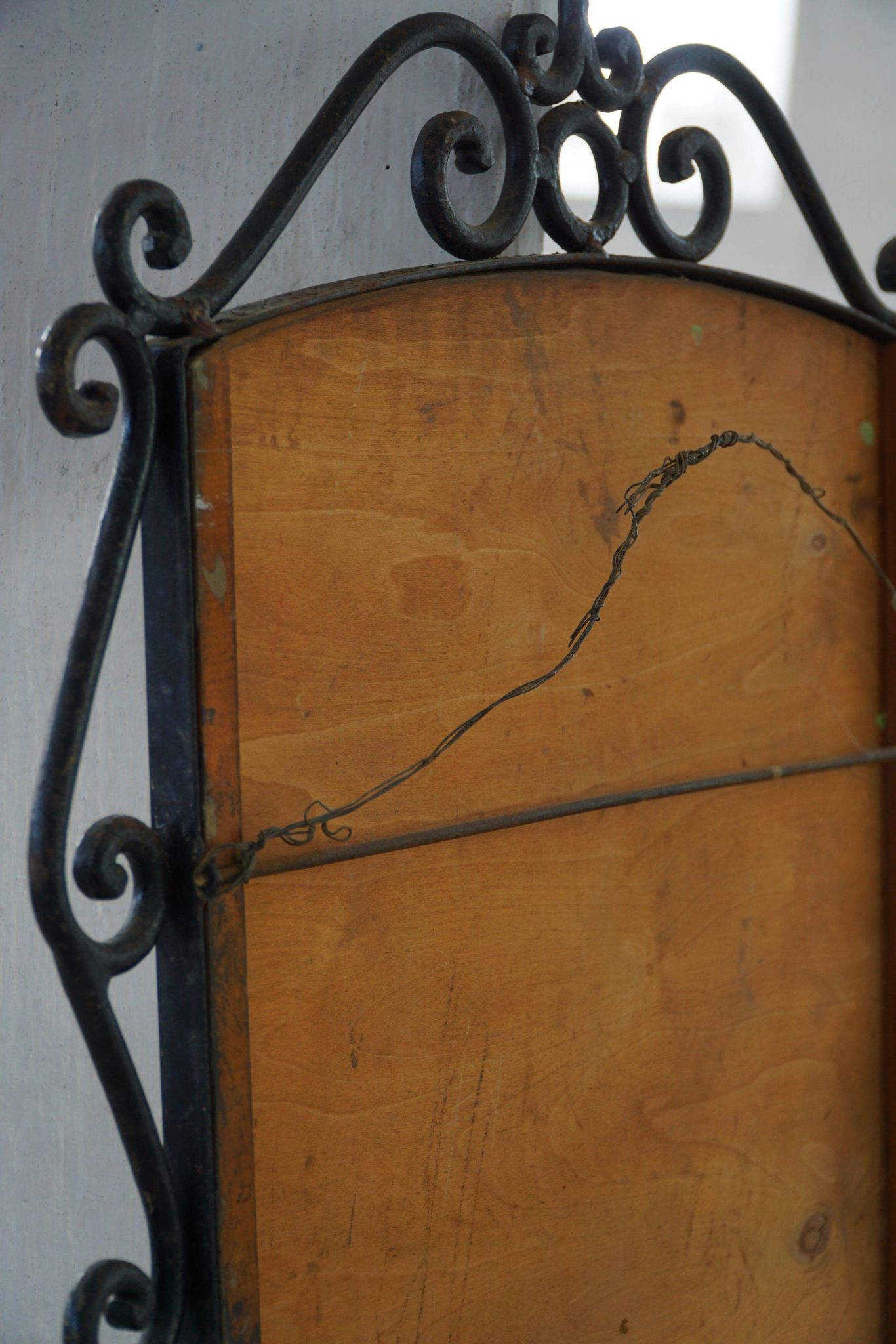 French mid-century brutalist wall mirror in wrought iron, made in the 1950s.