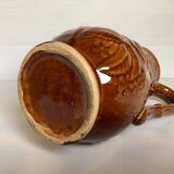 Brown pitcher with rose motifs
