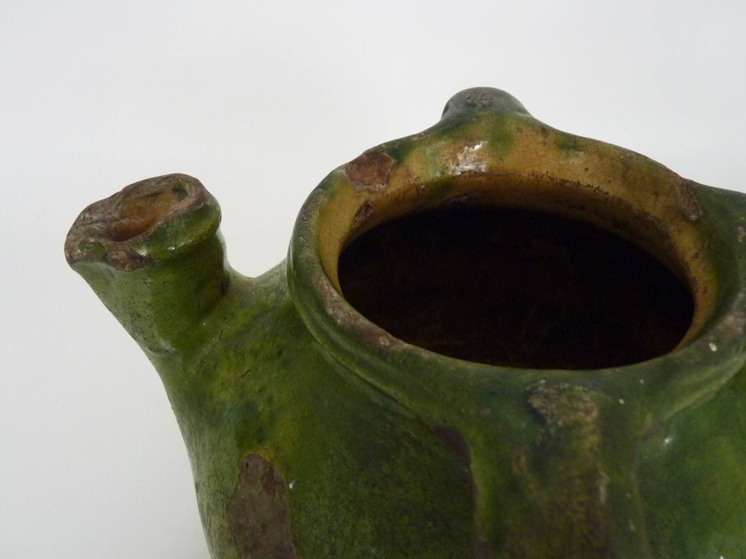 Gargoulette, pottery water pitcher in glazed green terracotta, Haute Pyrénées. 18th century