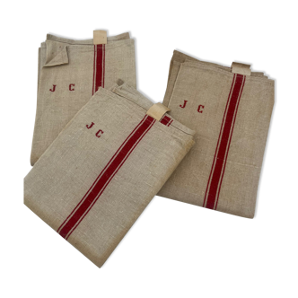 Set of three old linen tea towels